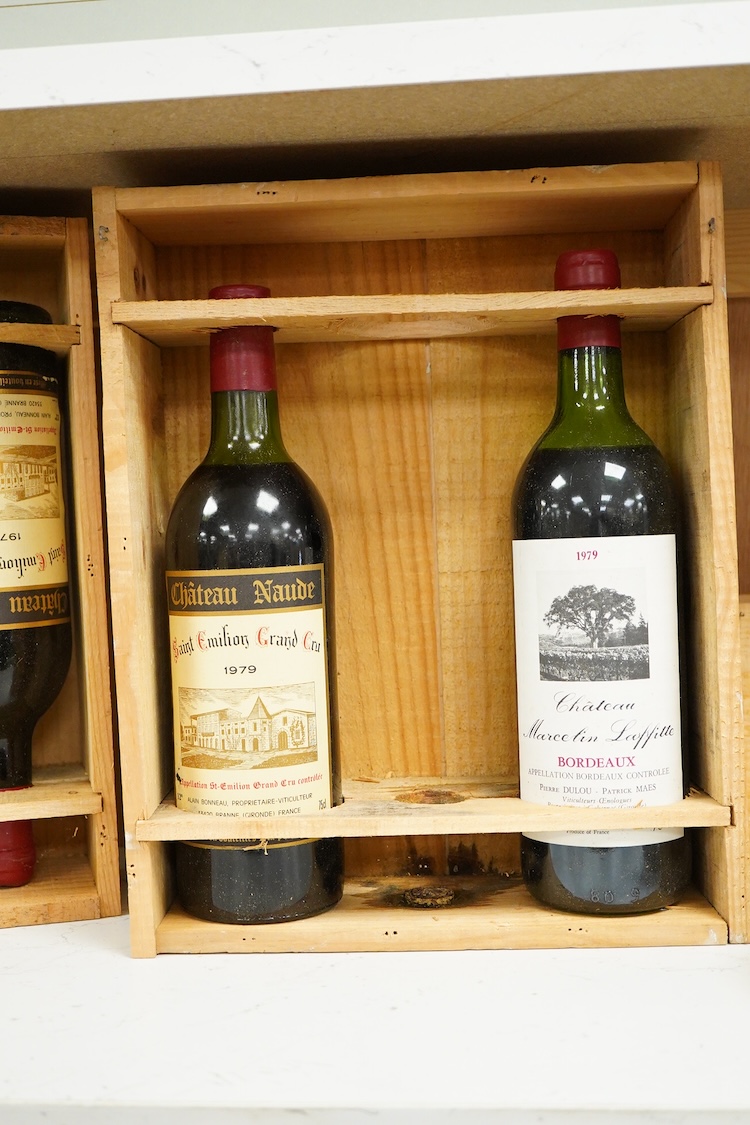 Five bottles of wine to include: two bottles of Bordeaux Chateau Marcelin Lafitte, 1979, two bottles of Chateau Naude Saint Emilion Grand Cu 1979 and a Chateau Lagut Bordeaux Blanc Sec 1979.